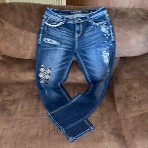 Woman’s size 28 mid rise boyfriend jeans